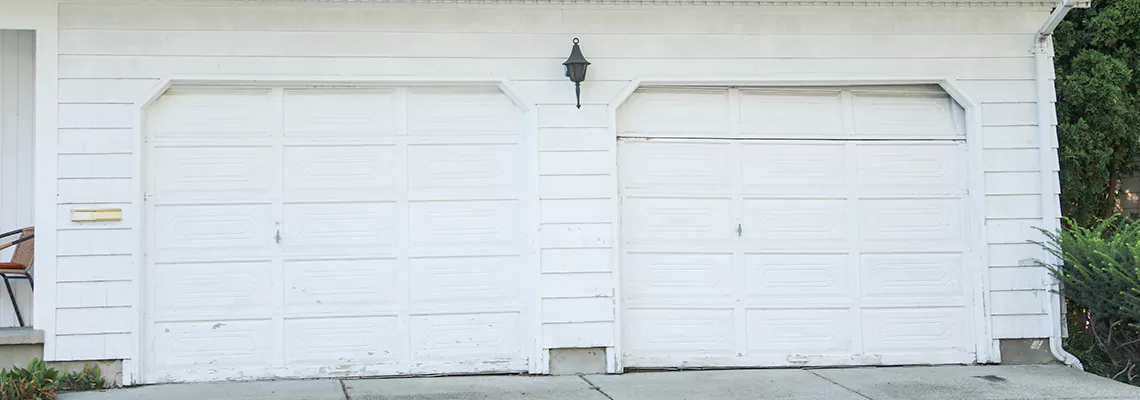 Roller Garage Door Dropped Down Replacement in DeKalb, IL