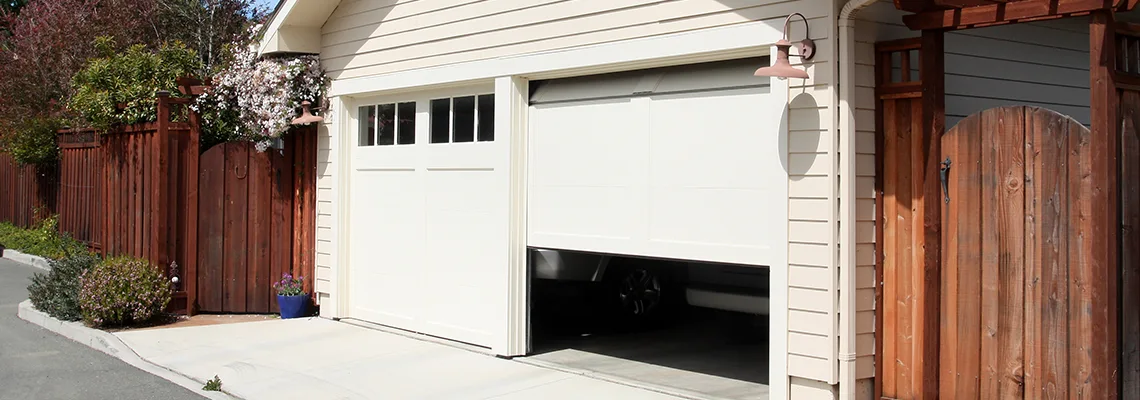 Fix Metal Garage Door Jerking in DeKalb, Illinois